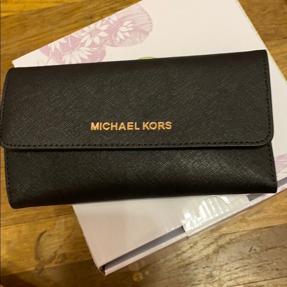 Michael Kors black leather wallet in gold